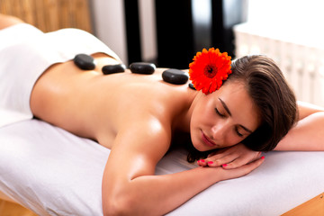 Obraz na płótnie Canvas Beauty massage with stones, massage concept