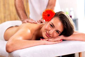 Obraz na płótnie Canvas Beauty massage of a young woman