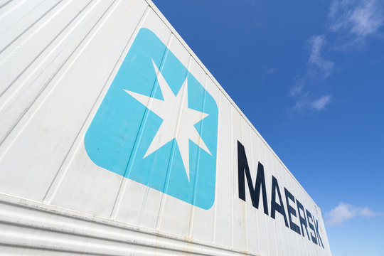 MAASVLAKTE, THE NETHERLANDS - June 25, 2018: Maersk 40 ft intermodal refrigerated container against blue sky. Maersk is the largest container ship operator in the world.