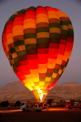 Africa, Egypt, Luxor. Hot Air Balloon launching from Luxor Egypt over the Valley of the Kings.