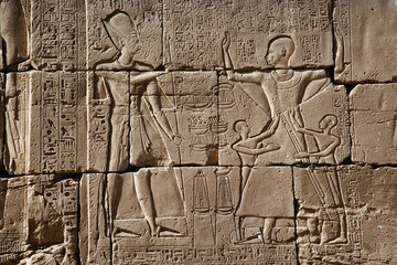 Hieroglyphs on wall, Temple of Karnak located at modern day Luxor or ancient Thebes, Egypt