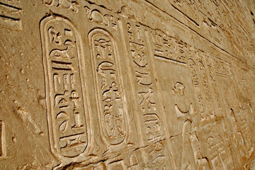 Cartouche and hieroglyph on main pylons of entrance to Temple of Horus, Edfu, Egypt