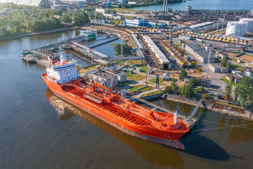 Aerial view large port with railway infrastructure for the delivery of bulk cargo by sea, loading...