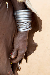 Africa, Ethiopia, Omo River Valley, South Omo, Hamer tribe. Arm bracelets worn by a Hamer woman.