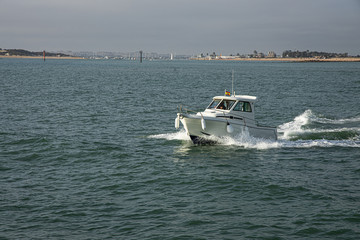small motor boat sailing the sea