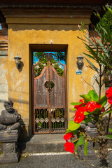 Fototapeta na wymiar .Traditional wooden door in Bali, Indonesia