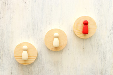 business concept image of people figures over wooden table, human resources and management concept