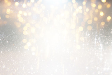 blackground of abstract glitter lights. silver and gold. de-focused