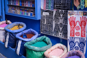 Morocco, Chefchaouen. Powdered paint pigments for sale at a shop.