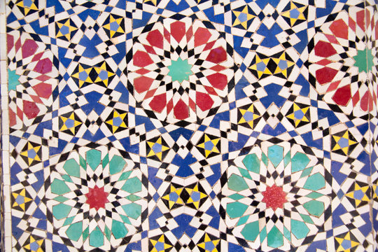 Africa, Morocco, Fes, Fes Medina, Tiles in Morocco are also named Zellige, Zellij or Zillij, are hand crafted natural clay tile with origins in the ancient Mediterranean and Middle East.