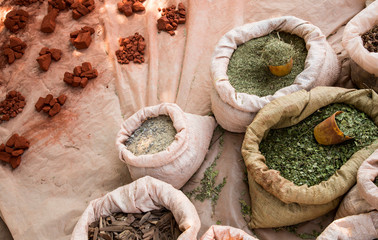 Africa, Namibia, Opuwo. Perfumed herbs and ochre at the Himba market.