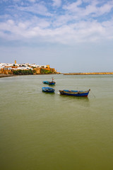 Rabat, Morocco. Blue wooden boats floating in the harbor