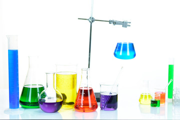 Laboratory glassware with colorful chemical reagent in research laboratory 