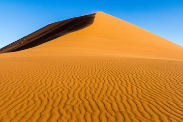 Fototapeta na wymiar Africa, Namibia, Namib-Naukluft National Park. Patterns in sand dune.