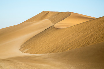 Africa, Namibia, Namib Desert. Pinwheel pattern on sand dunes.