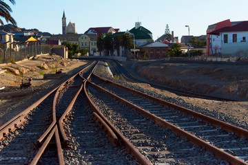 Fototapeta na wymiar Railway tracks going through Luderitz, Karas Region, Namibia