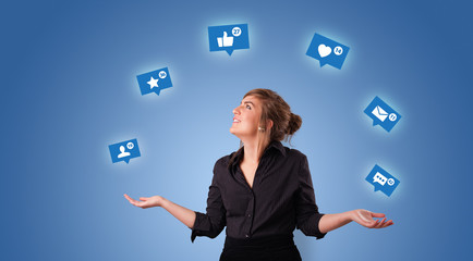 Young person playing with social media symbols