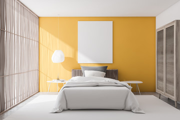 Yellow bedroom interior with poster