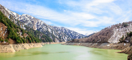Naklejka na ściany i meble Kurobe Dam in Tateyama Kurobe Alpine Route, Japan