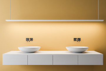 Fototapeta na wymiar Yellow bathroom interior with double sink