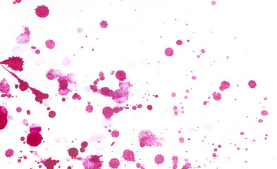 Multi-colored splashes of watercolor paints on white paper. Abstract background