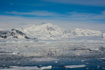 South of the Antarctic Circle, near Adelaide Island. The Gullet. Ice floes.