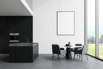 White and black panoramic kitchen with poster