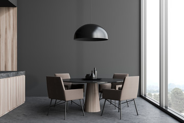 Gray dining room with round table