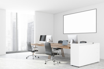 White office corner with horizontal poster