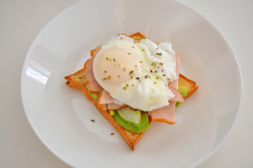 sandwich with egg, meat and vegetables
