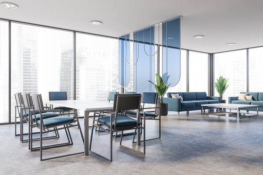 Panoramic meeting room with blue chairs and lounge