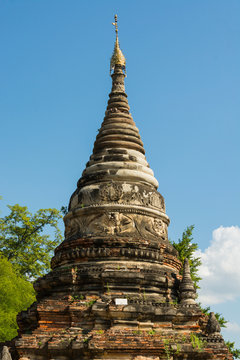 Myanmar. Mandalay. Inwa. Red brick stupa.