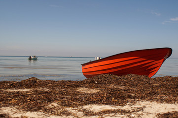 Red boat on the beach
