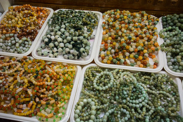 Myanmar. Yangon. Bogyoke Aung San Market. Jade trinkets for sale.