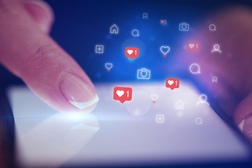 Finger touching phone with social media concept and dark background