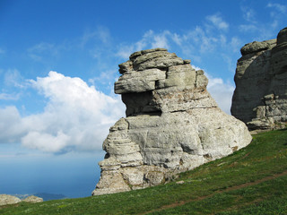 Rocks in the Valley Of Ghosts on the Southern Demerdzhi Mountain, Crimean mountains. Located near Alushta city with epic clouds, nature hiking