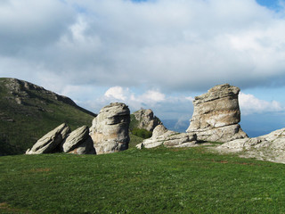 Rocks in the Valley Of Ghosts on the Southern Demerdzhi Mountain, Crimean mountains. Located near Alushta city with epic clouds, nature hiking	