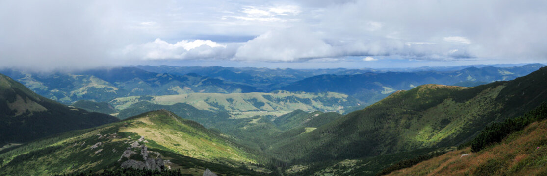 Carpathian Czarnohora mountains epic view summer traveling panorama aerial landscape. Cloudy, scenic nature hiking