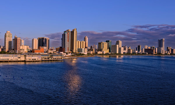 Evening sea departure in a setting sun from Manila, Philippines