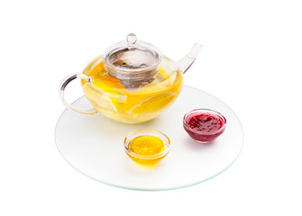 Glass teapot with hot herbal tea