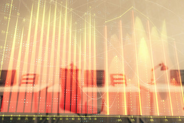 Stock and bond market graph with trading desk bank office interior on background. Multi exposure. Concept of financial analysis