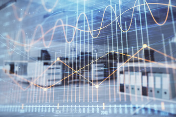 Stock market chart with trading desk bank office interior on background. Double exposure. Concept of financial analysis