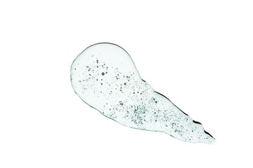 Transparent green drop of face wash gel on white background