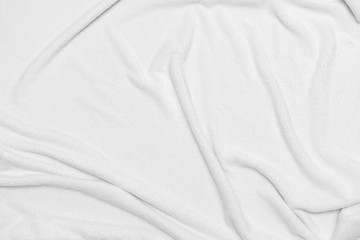 White crumpled blanket, texture, background, top view