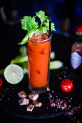 bloody mary cocktail with fresh tomatoes juice, salt & pepper