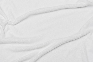 White crumpled blanket, texture, top view