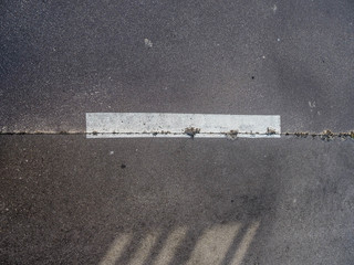 Fototapeta premium Picture from above of an old white line in a break road on the north of Galicia. 