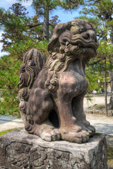Fototapeta na wymiar Japan, Amanohashidate. Lion/Dog idol at Chionji Temple. 