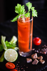 bloody mary cocktail with fresh tomatoes juice, salt & pepper
