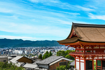 Fototapeta premium Kyoto, Japan. Main entrance gate to the Kiyomizudera temple, a UNESCO World Heritage Site, overlooking the city of Kyoto and mountains
